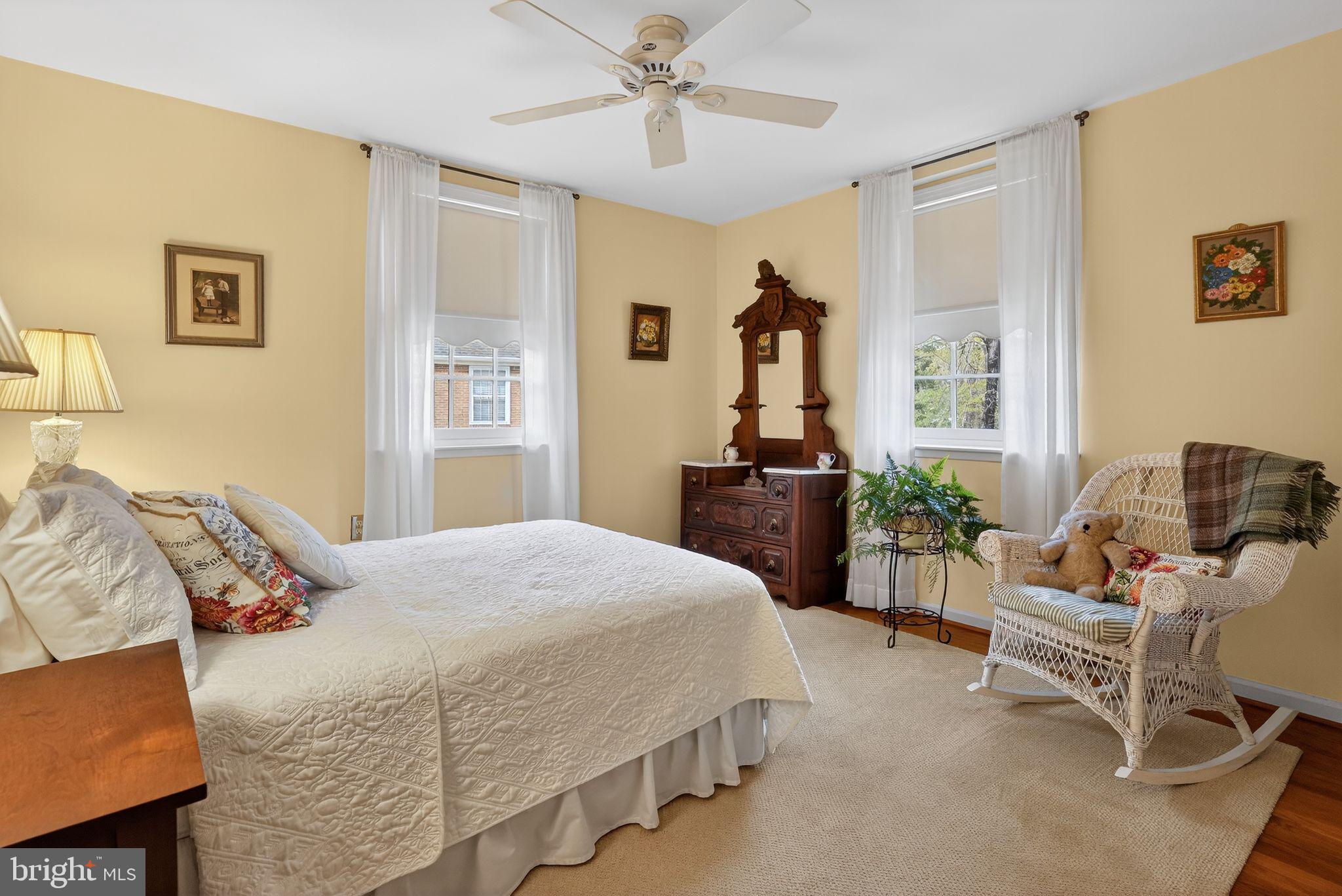 1510 Eton Way Crofton, MD 21114 - Photo 33 of 51 a bedroom with a bed and wooden floor