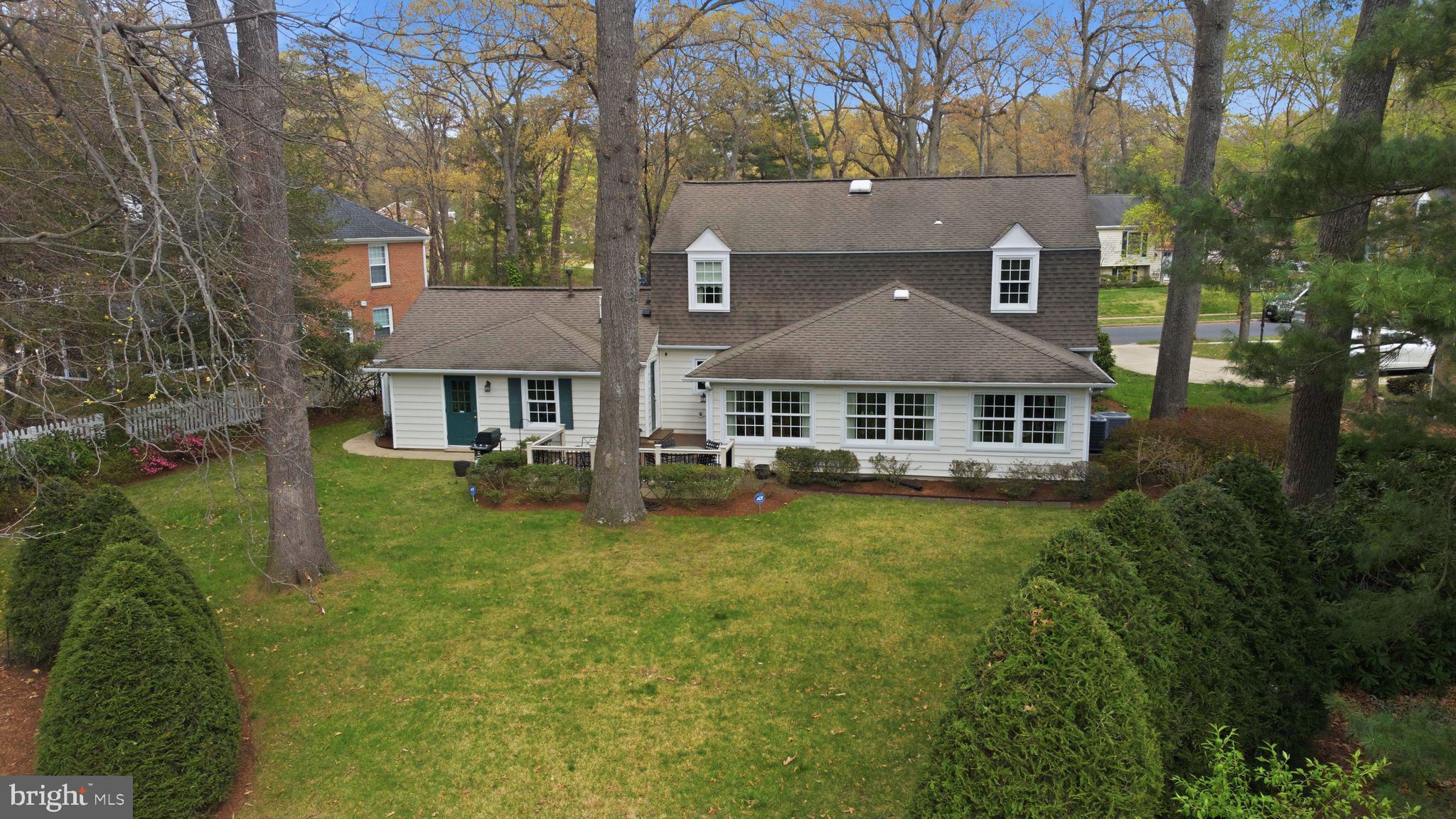 1510 Eton Way Crofton, MD 21114 - Photo 43 of 51 a aerial view of a house next to a big yard and large trees