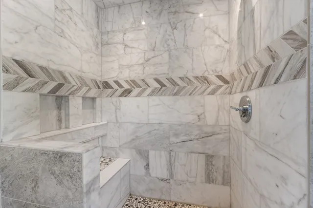 a view of a balcony with wooden floor