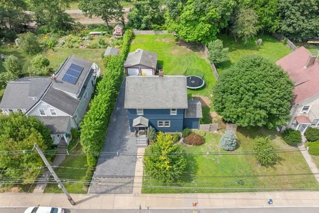an aerial view of residential house with outdoor space