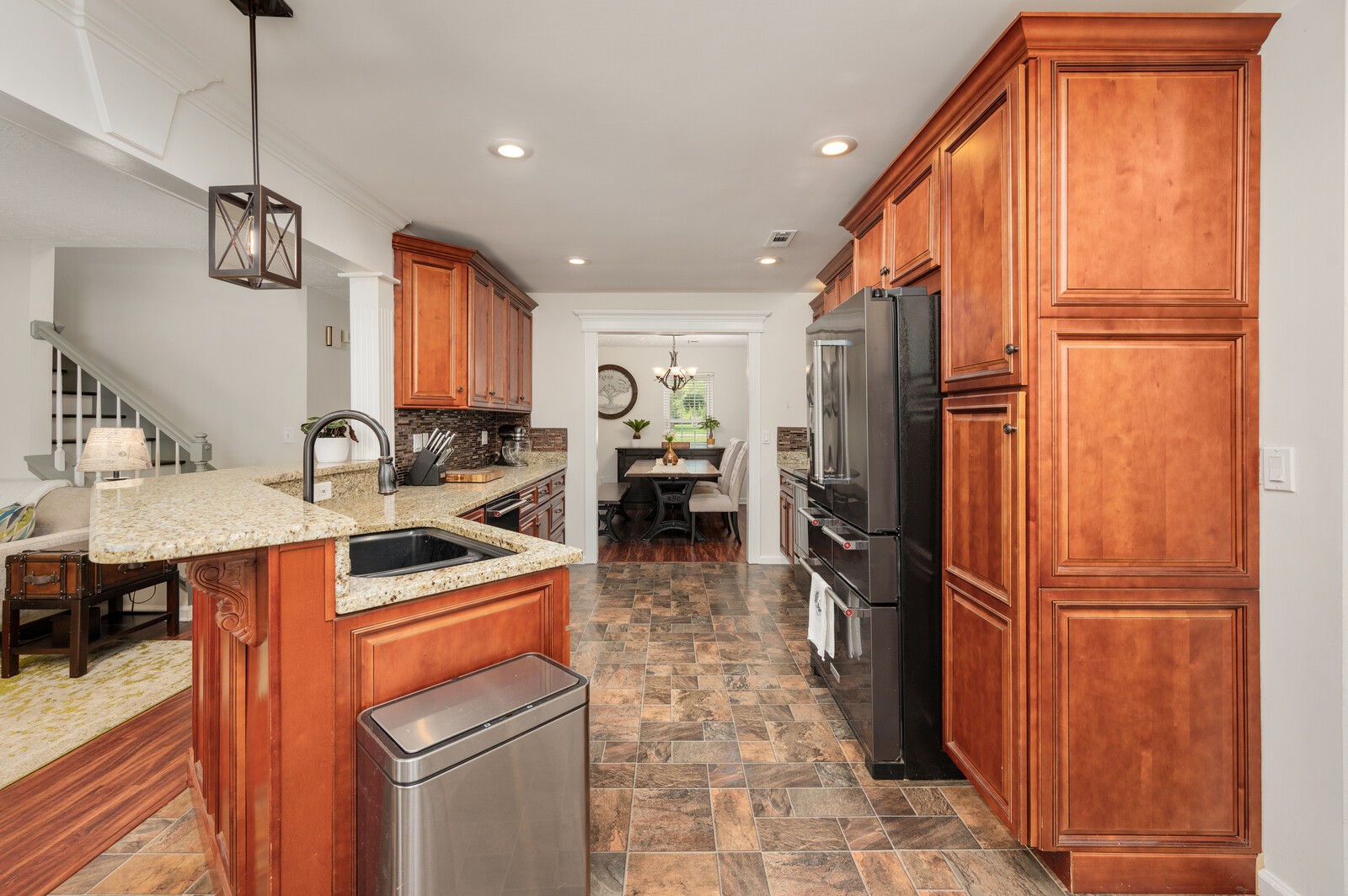 1123 Bramble Trail Murfreesboro, TN 37129 - Photo 15 of 60 a kitchen with a refrigerator and a sink