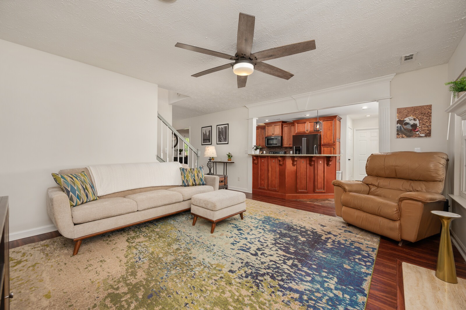 1123 Bramble Trail Murfreesboro, TN 37129 - Photo 24 of 60 a living room with furniture and a kitchen view