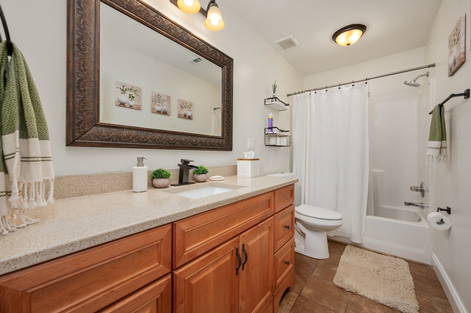 1123 Bramble Trail Murfreesboro, TN 37129 - Photo 38 of 60 a bathroom with a granite countertop sink a toilet and a shower