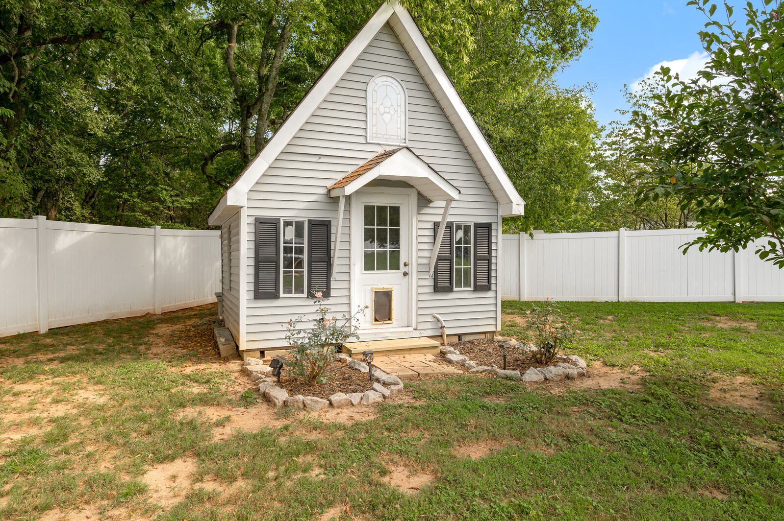 1123 Bramble Trail Murfreesboro, TN 37129 - Photo 52 of 60 a view of a house with a yard and sitting area