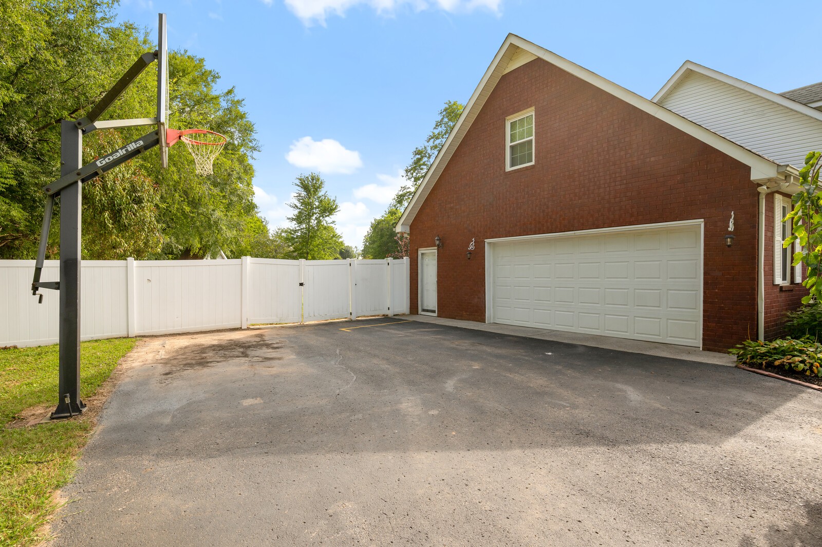 1123 Bramble Trail Murfreesboro, TN 37129 - Photo 60 of 60 a front view of a house with a yard and garage