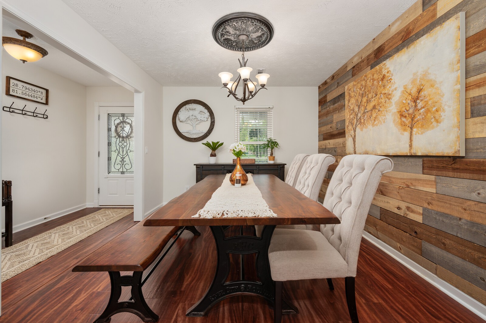 1123 Bramble Trail Murfreesboro, TN 37129 - Photo 10 of 60 a view of a dining room with furniture a chandelier and wooden floor