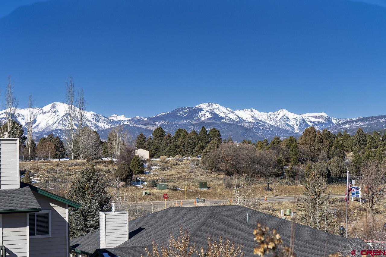 1100 Goeglein Gulch Road, Unit 222 Durango, CO 81301 - Photo 3 of 32 a view of a city with sunset view