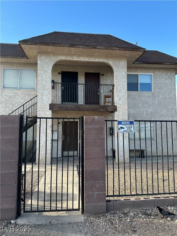 Gate with a fenced front yard