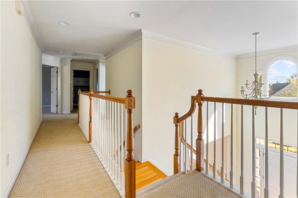 1355 Chattahoochee Run Drive Suwanee, GA 30024 - Photo 15 of 57 a view of a hallway to a house