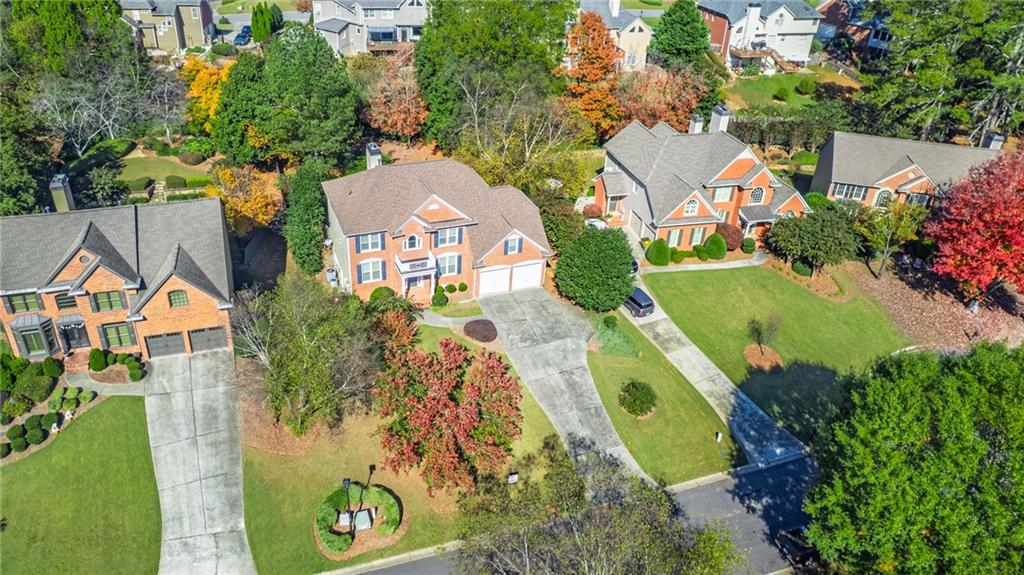 1355 Chattahoochee Run Drive Suwanee, GA 30024 - Photo 2 of 57 an aerial view of a house