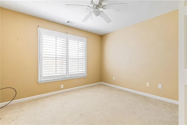 a bathroom with 2 sink tub and a mirror
