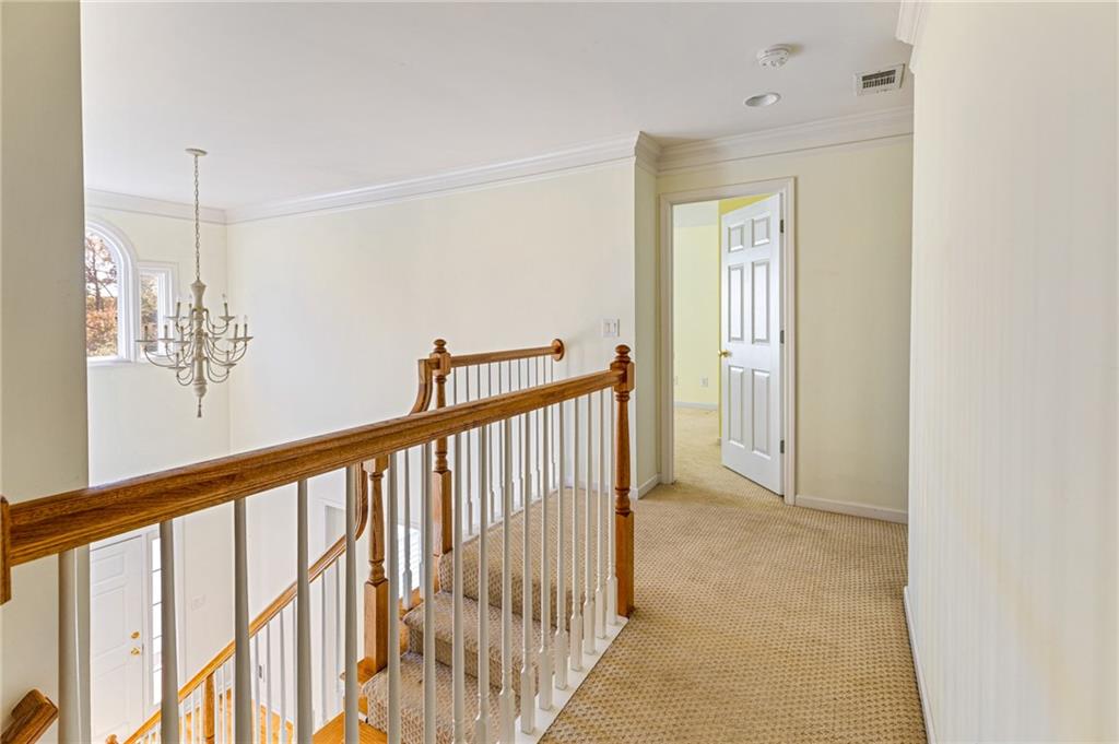 1355 Chattahoochee Run Drive Suwanee, GA 30024 - Photo 29 of 57 a view of hallway with stairs