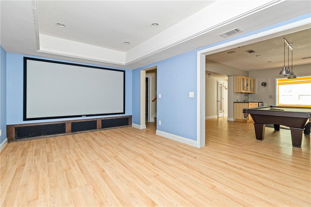 1355 Chattahoochee Run Drive Suwanee, GA 30024 - Photo 34 of 57 a bedroom with a bed and a table