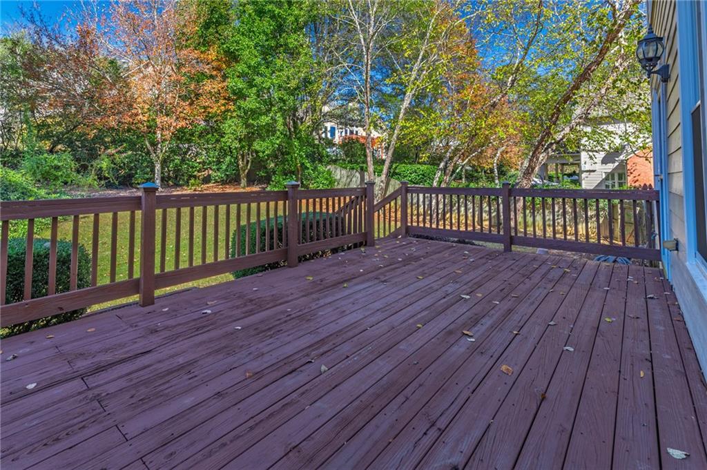 1355 Chattahoochee Run Drive Suwanee, GA 30024 - Photo 45 of 57 a view of deck with wooden floor and fence