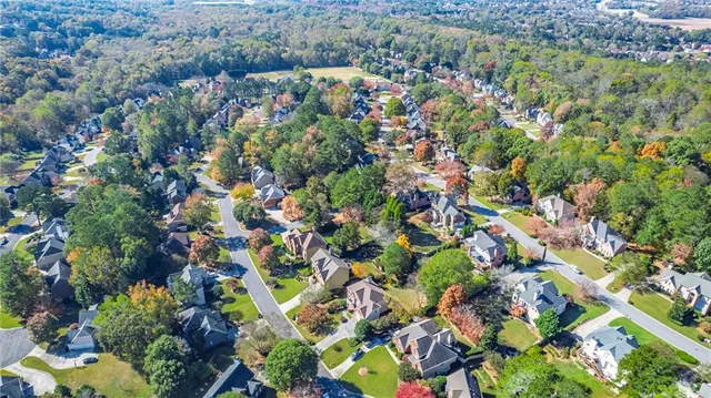 a view of a yard with swimming pool