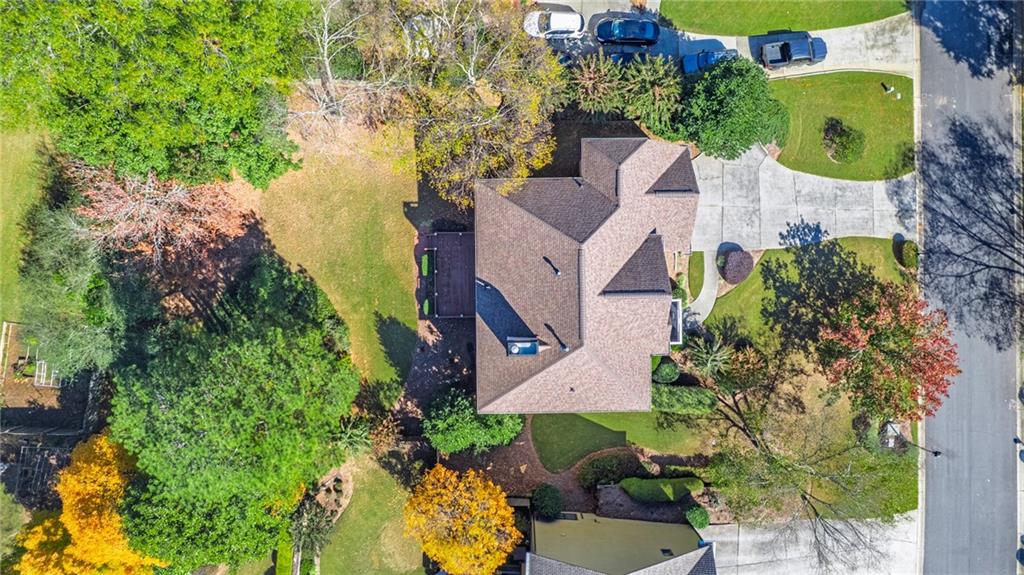 1355 Chattahoochee Run Drive Suwanee, GA 30024 - Photo 50 of 57 an aerial view of a house with yard swimming pool and outdoor seating