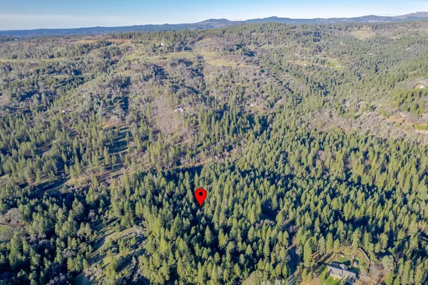 a view of an outdoor space with mountain view