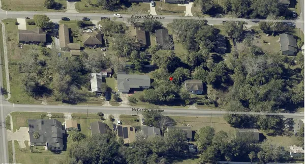 a view of a water fountain in a yard