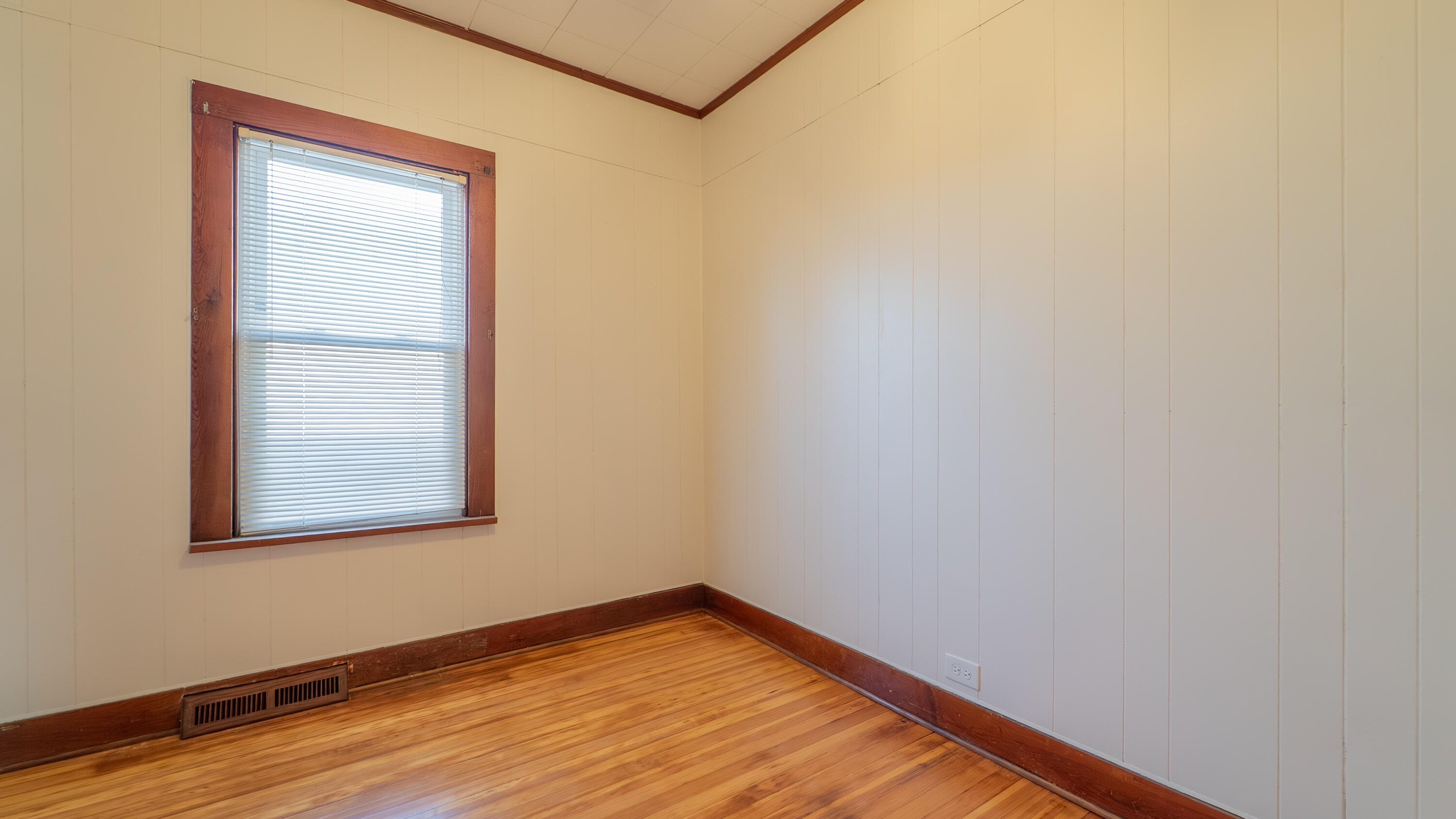 1013 Merrillville Road Crown Point, IN 46307 - Photo 20 of 36 a view of a small space with wooden floor and a window