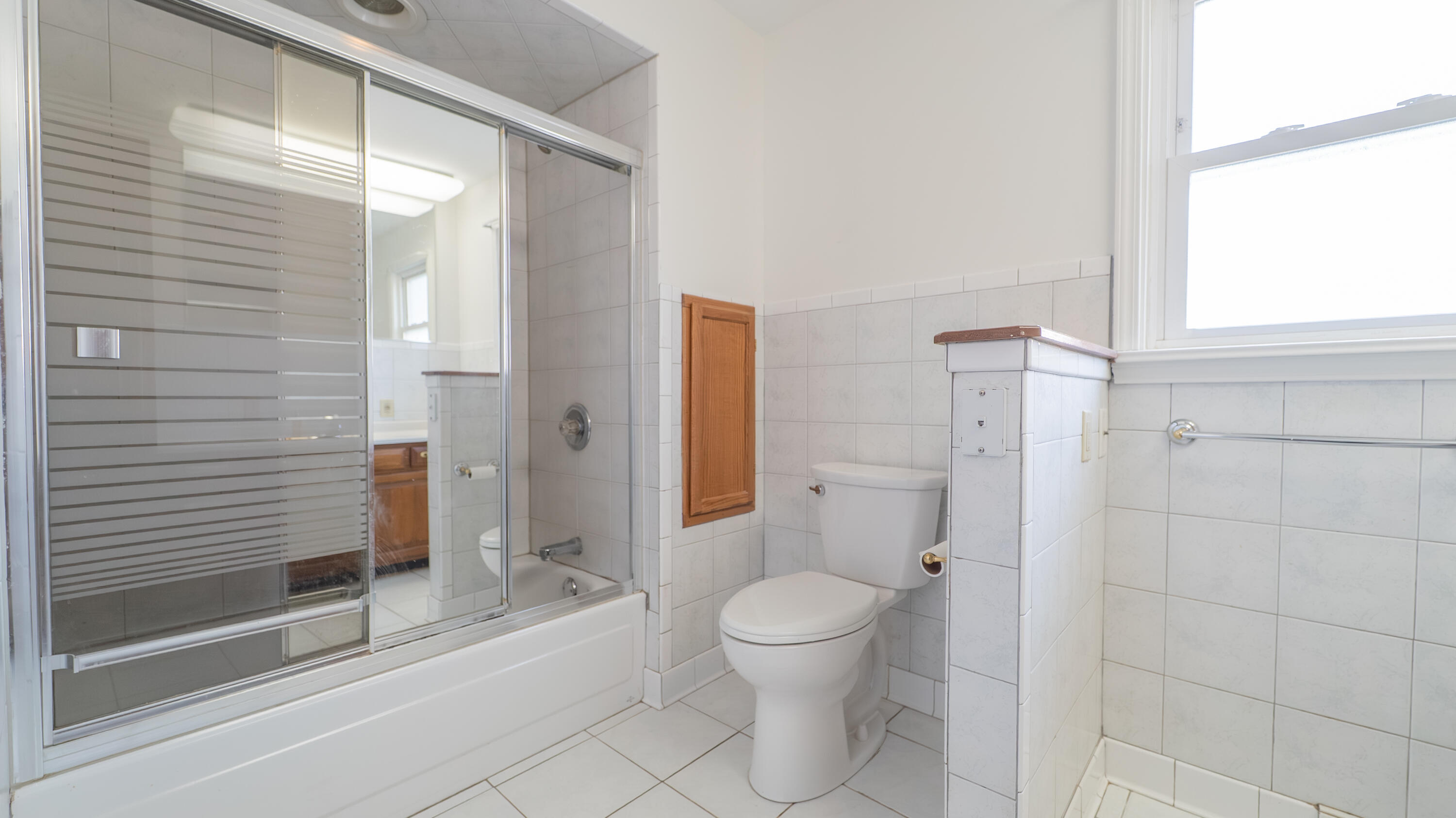 1013 Merrillville Road Crown Point, IN 46307 - Photo 24 of 36 a bathroom with a toilet and a shower