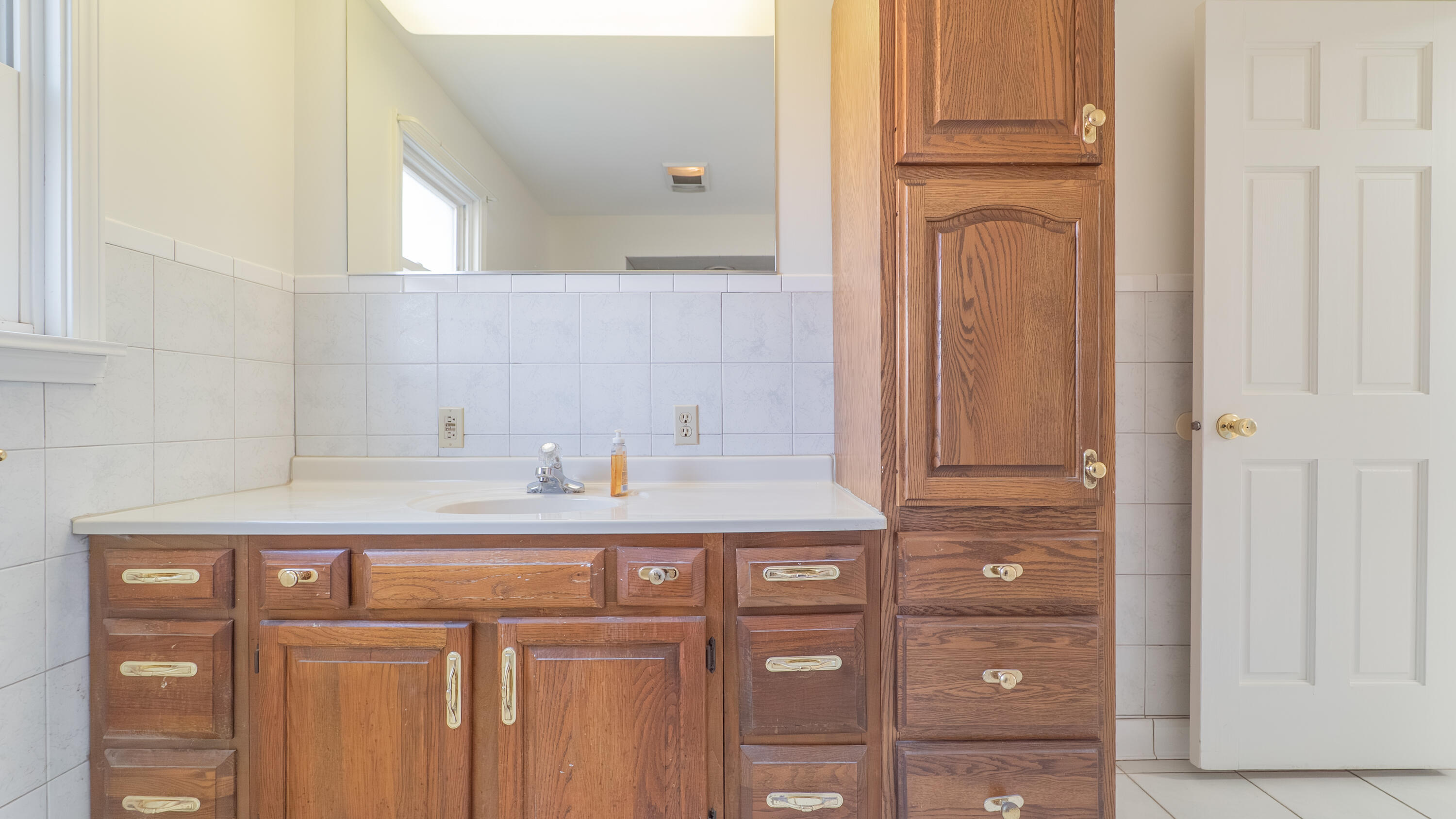 1013 Merrillville Road Crown Point, IN 46307 - Photo 25 of 36 a kitchen with a sink and cabinets