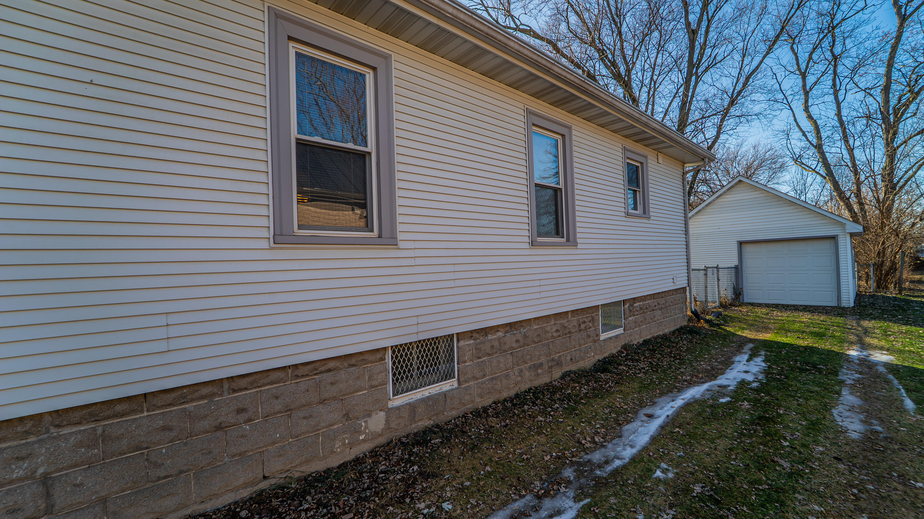 1013 Merrillville Road Crown Point, IN 46307 - Photo 33 of 36 a view of a house with a yard
