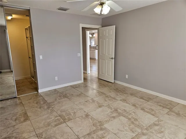 a view of an empty walk in closet
