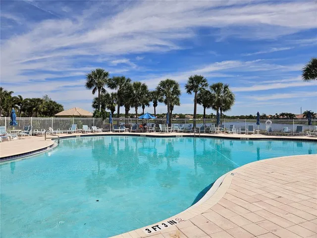 a view of a swimming pool with an ocean view