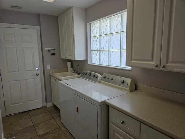 a view of a house with a small yard