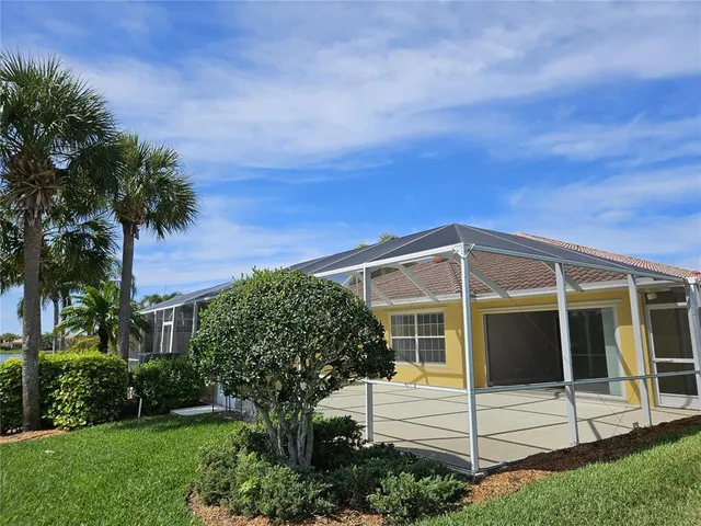 a view of a lake with a big yard