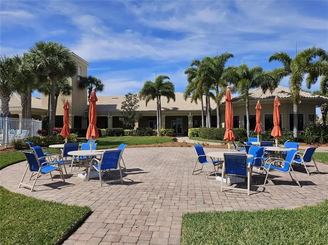 a view of a terrace with yard