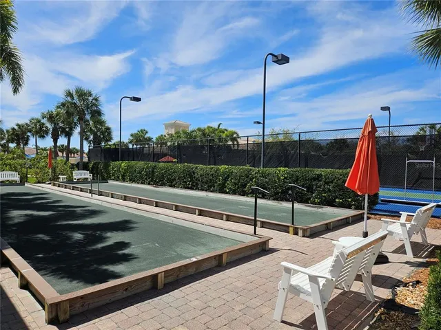 a view of a swimming pool with a patio