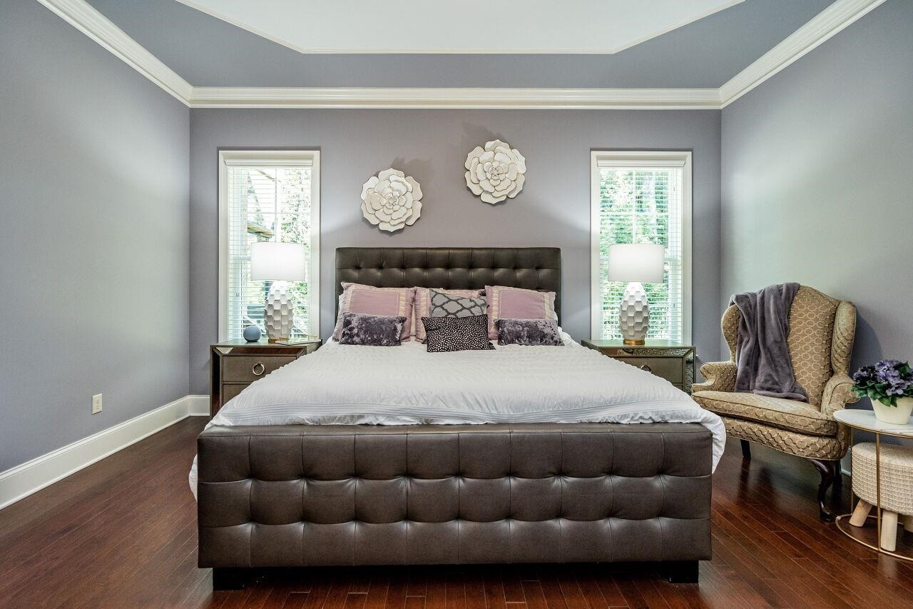 8035 Brandyapple Drive Raleigh, NC 27615 - Photo 14 of 30 Spacious Owners Suite with ceiling detail, two piece crown and hardwood floors. Owners Suite
