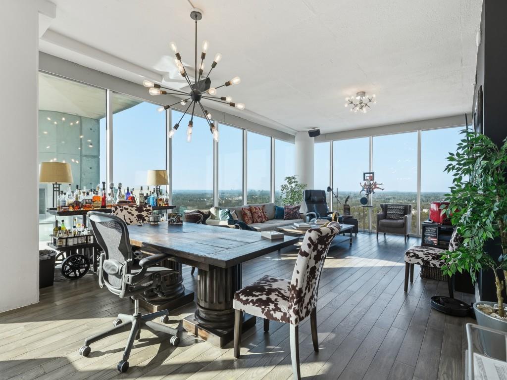 361 17th Street Northwest, Unit 2622 Atlanta, GA 30363 - Photo 23 of 35 a view of a dining room with furniture window and wooden floor