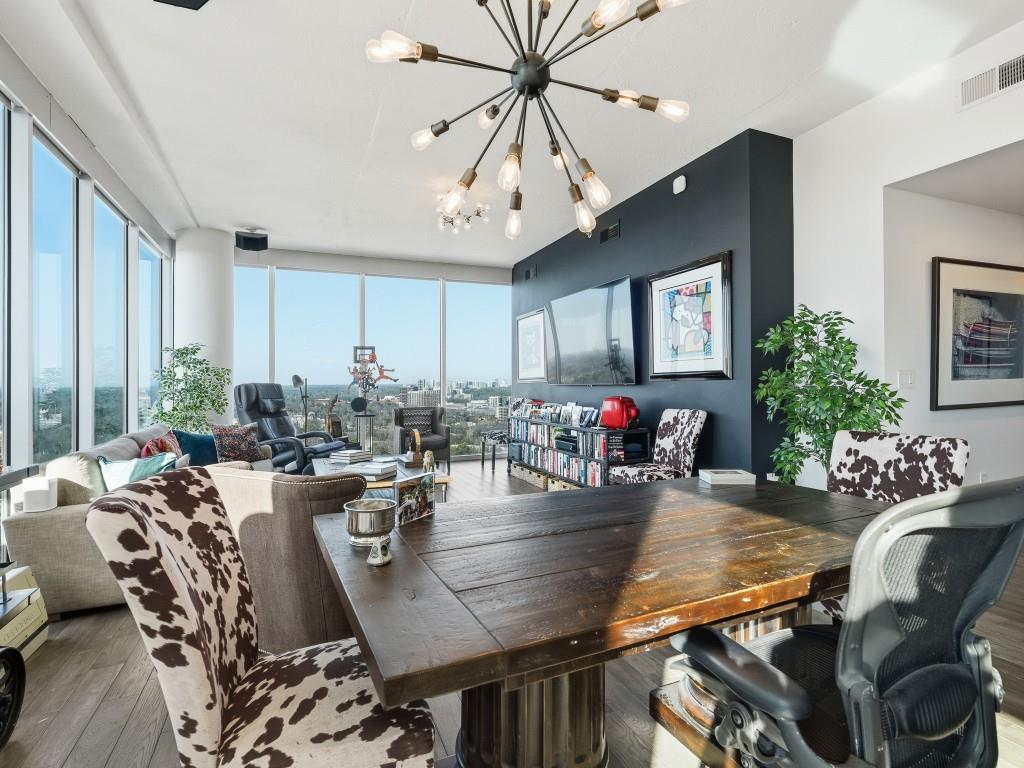 361 17th Street Northwest, Unit 2622 Atlanta, GA 30363 - Photo 24 of 35 a view of a dining room with furniture window and wooden floor