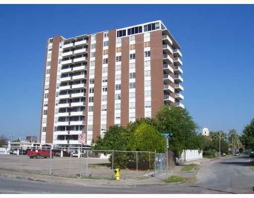 a front view of a building with street view
