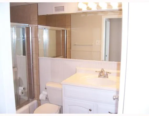 a picture of a room with wooden floor