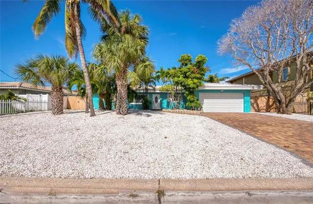 a view of a backyard of the house
