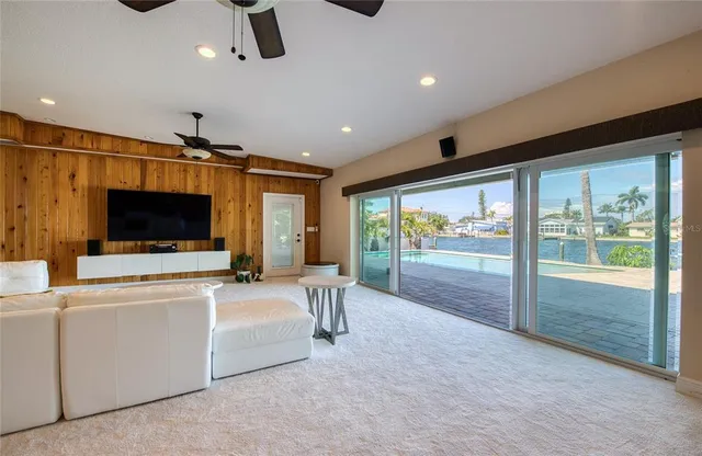 a view of living room with furniture and flat screen tv