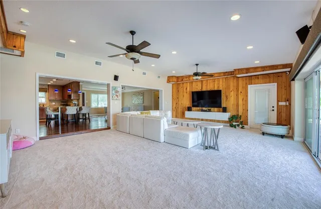 a view of a swimming pool with an outdoor seating