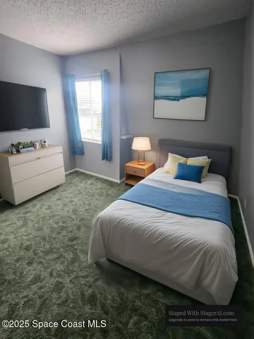 a bathroom with a bathtub and a sink