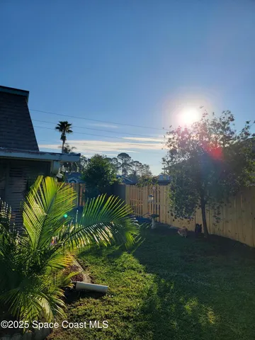 a swimming pool with outdoor seating