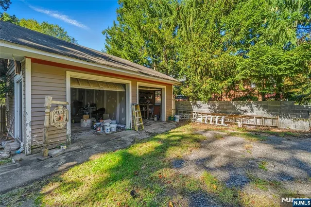 a view of sitting area in front of house