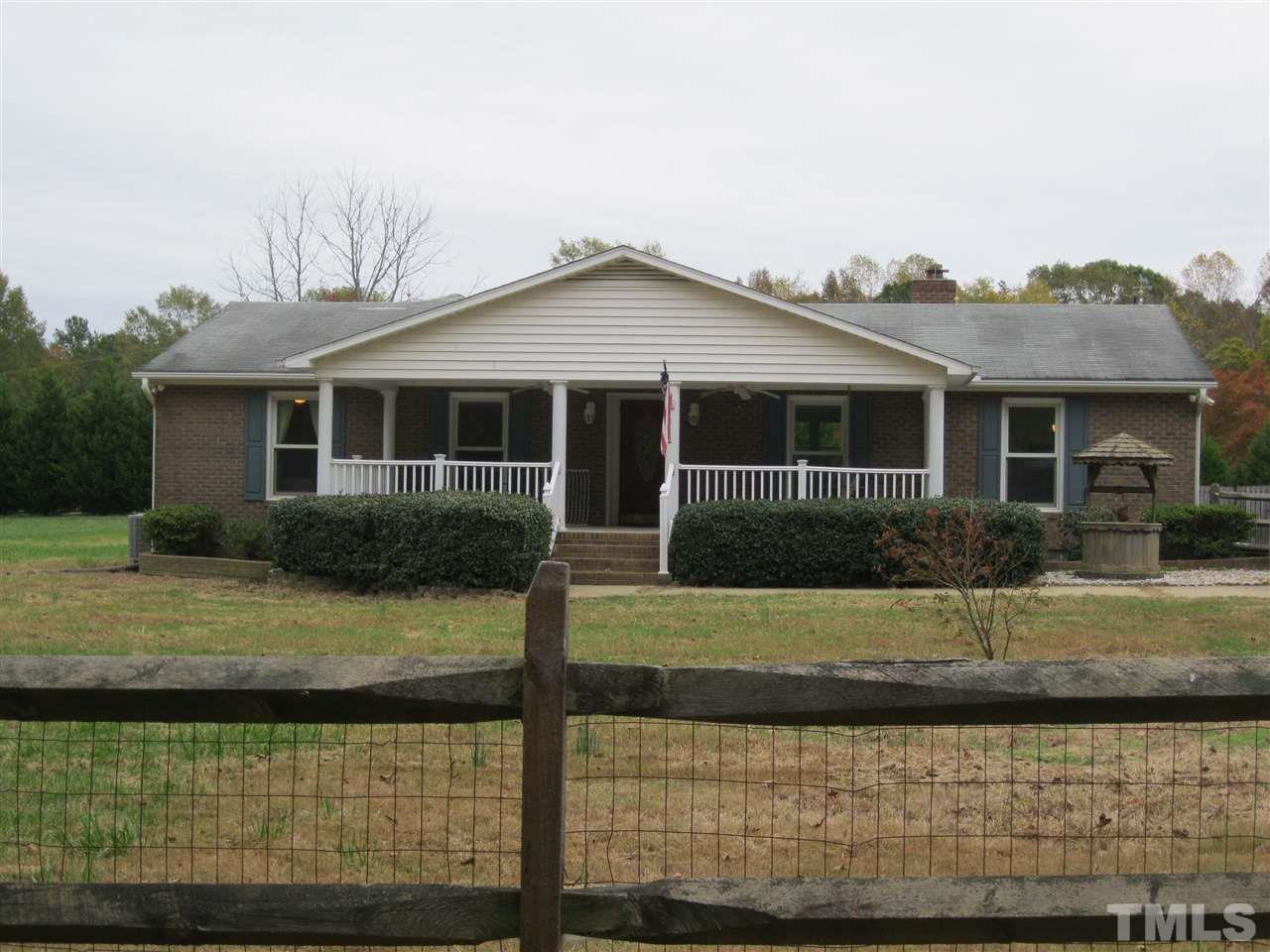 6107 Jackson Road Rougemont, NC 27572 - Photo 1 of 25 a front view of a house with a yard