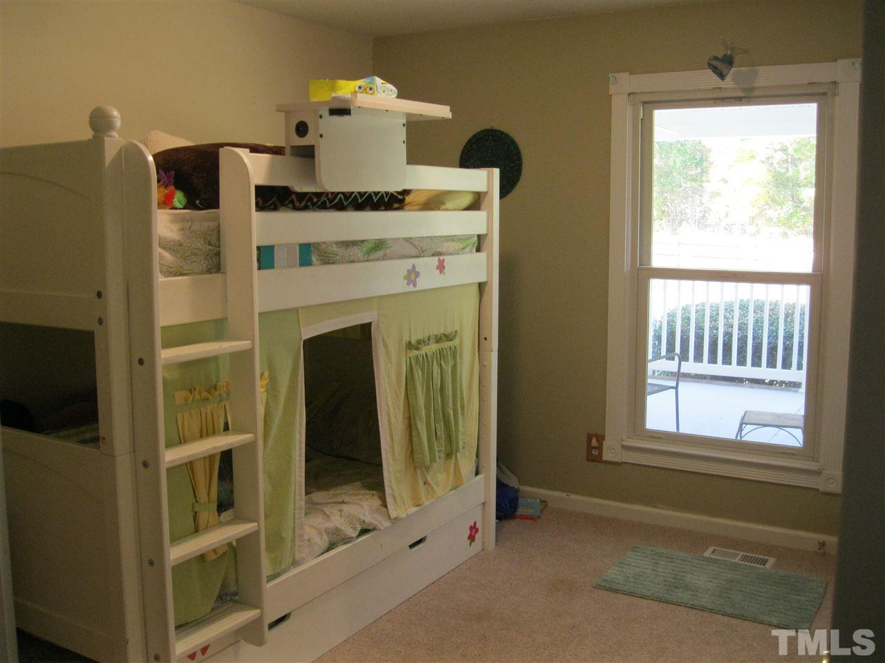 6107 Jackson Road Rougemont, NC 27572 - Photo 14 of 25 a kitchen with windows and cabinet
