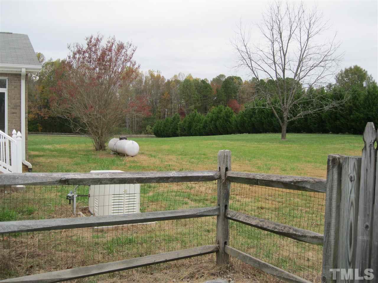 6107 Jackson Road Rougemont, NC 27572 - Photo 4 of 25 a view of a backyard and a yard