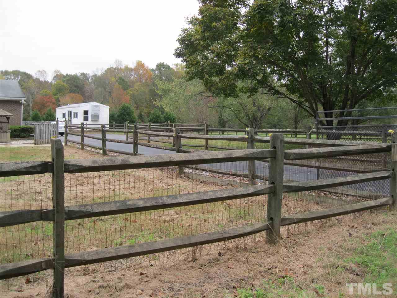 6107 Jackson Road Rougemont, NC 27572 - Photo 5 of 25 a view of a swimming pool with a yard