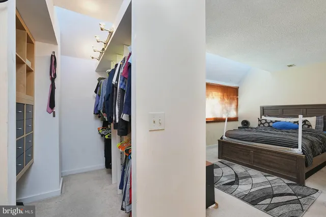 a view of a livingroom with furniture and windows