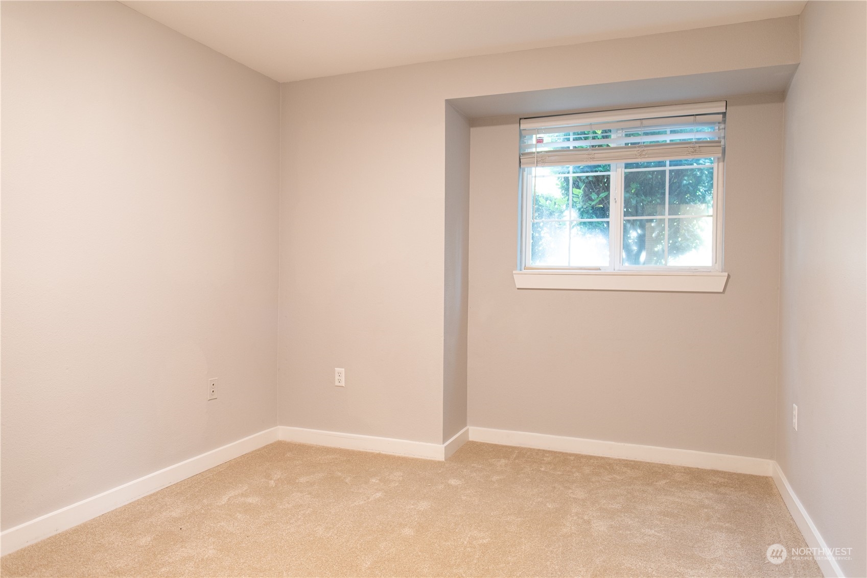11002 Southeast Petrovitsky Road, Unit H103 Renton, WA 98055 - Photo 7 of 20 an empty room with a window