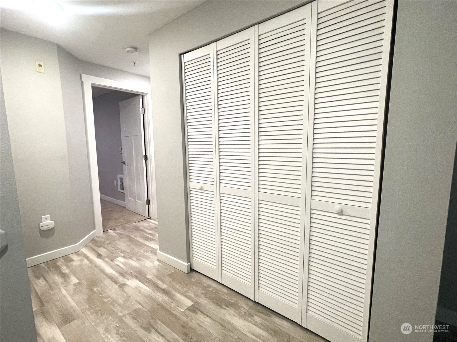11002 Southeast Petrovitsky Road, Unit H103 Renton, WA 98055 - Photo 9 of 20 a view of a room with a white walls